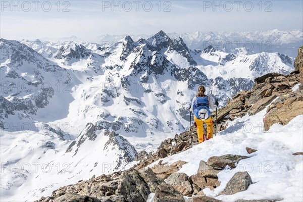 Mountaineer at the summit of the Sulzkogel