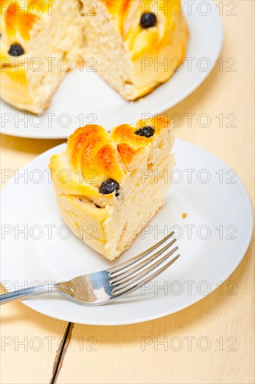 Fresh home baked blueberry bread cake dessert over white wood table