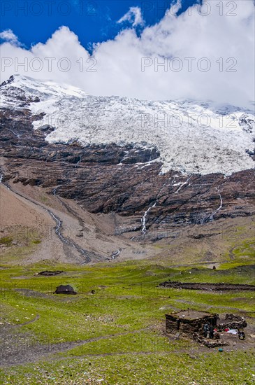 Hut below a glacier on the Karo-La Pass along the Freindship Highway