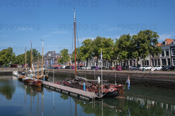 Historic ships in the museum harbour at the Old Harbour