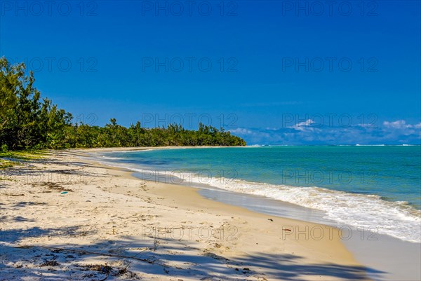 Long white sand beach in the east of the island Ile Sainte-Marie although Nosy Boraha