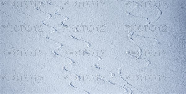 Single ski tracks in fresh snow