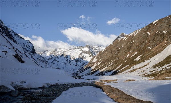 Snow-covered mountains in the evening light