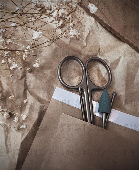 A set of sterile manicure tools in a craft package. Nail salon. Close-up