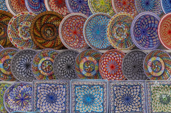 Coloured ceramic plates at the weekly market market in Portoferraio