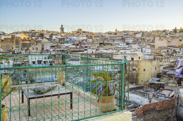 Old historic downtown called medina with rooftop terrace in the foreground