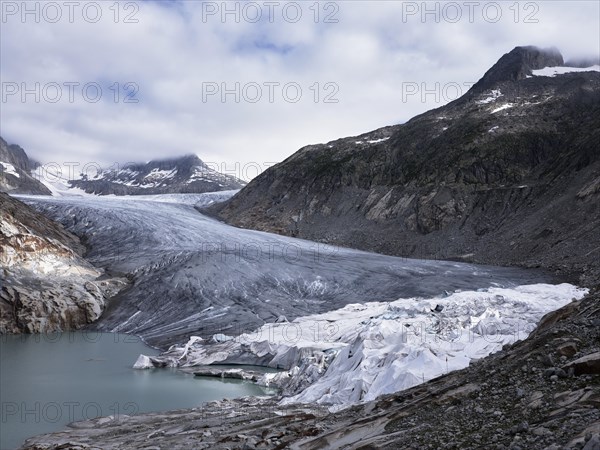 Rhone glacier partially covered with white tarpaulins to protect it from melting