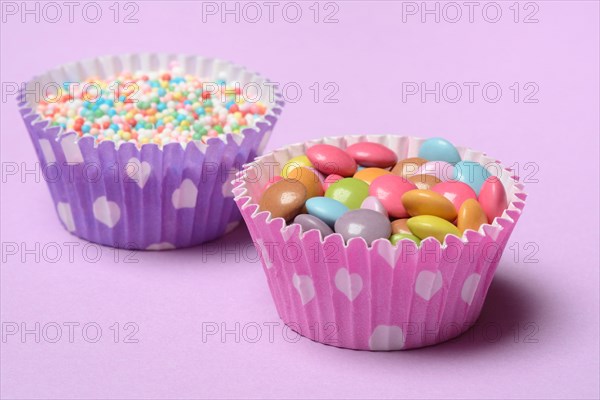 Chocolate lentils and love beads in paper moulds