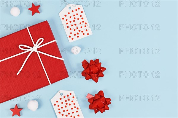 Christmas flat lay with red gift boxes and ribbons