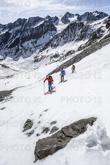 Ski tourers climbing Lisenser Ferner