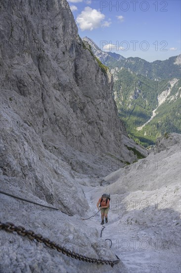 Steep climb secured with iron chain in the Gsengscharte