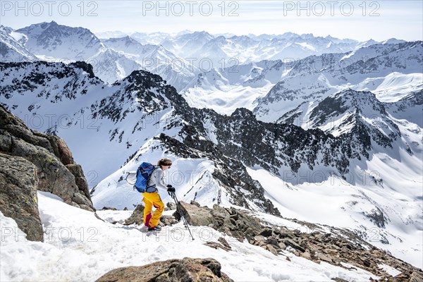 Mountaineer at the summit of the Sulzkogel