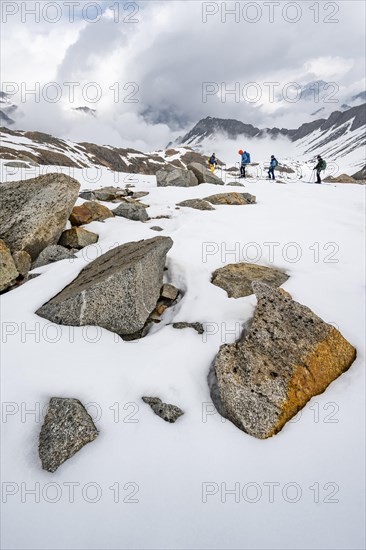 Ski tourers on the descent in Stiergschwez