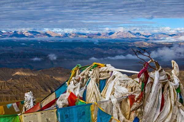 Prayer flags over the eroded mud landscape in the kingdom of Guge