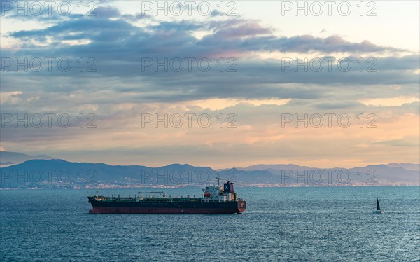 Oil Tanker Ship on Mediterranean Sea at sunrise