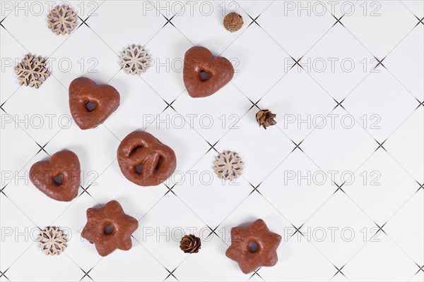 Top view of German glazed gingerbread Christmas cookies called 'Lebkuchen' in various shapes