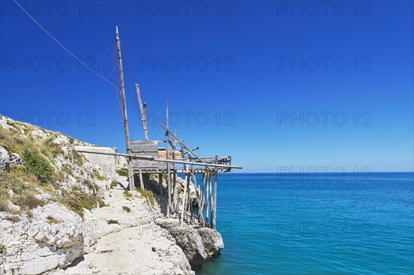 Fishing trabocco on rocky beach