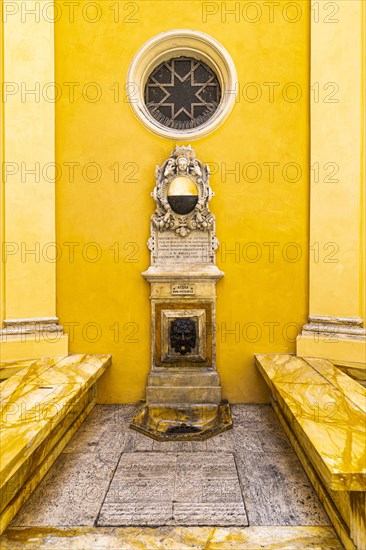 Fountain bordered with marble