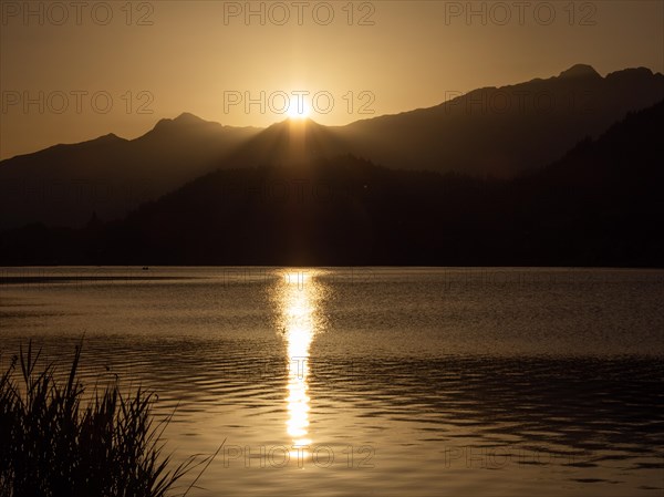 Evening atmosphere at sunset at Lake Weissensee