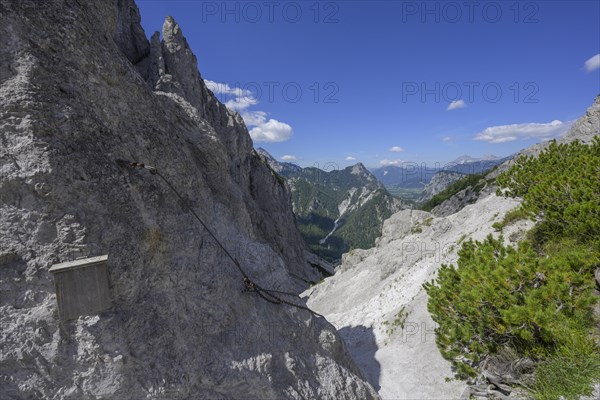 Steep climb secured with iron chain in the Gsengscharte