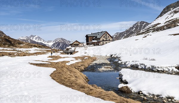 Oberbergbach and Franz-Senn-Huette mountain hut in winter