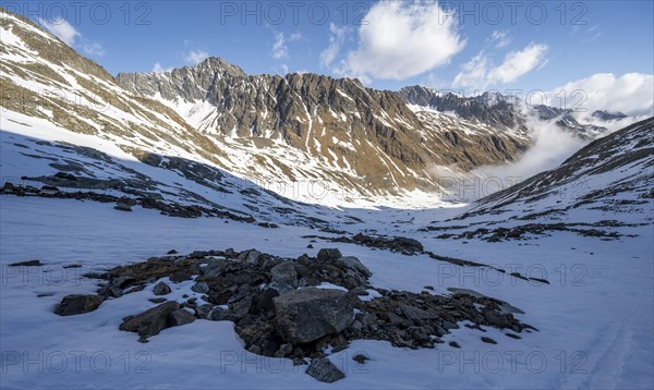 View of rocky mountain ridge into Oberbergtal