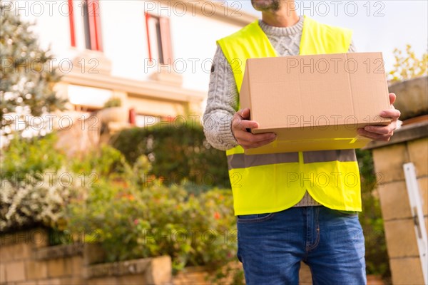 Parcel delivery carrier with a box from an online store