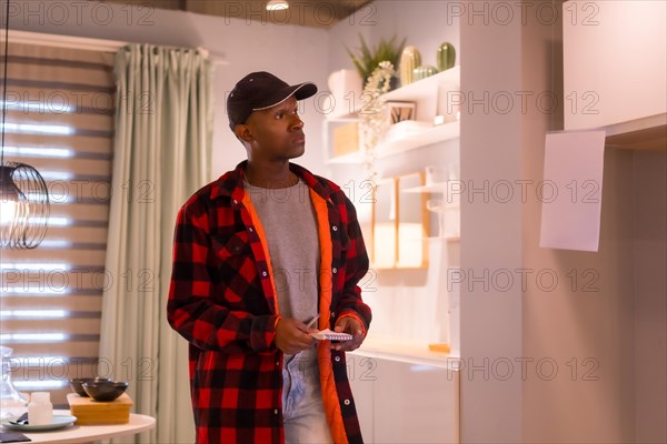 Black ethnic man shopping in a furniture store