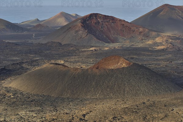 Different coloured volcanic cones