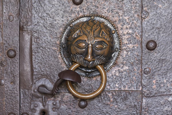 Historical door knocker at the Frauenwoerth monastery church