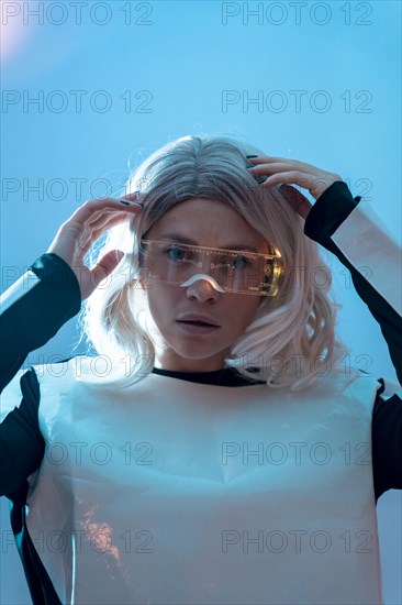 Portrait of woman with the futuristic glasses