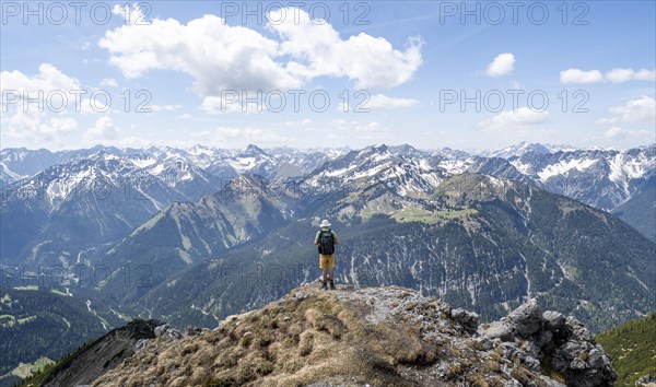 Hiker at the summit of Thaneller