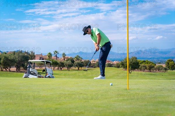 Man playing golf