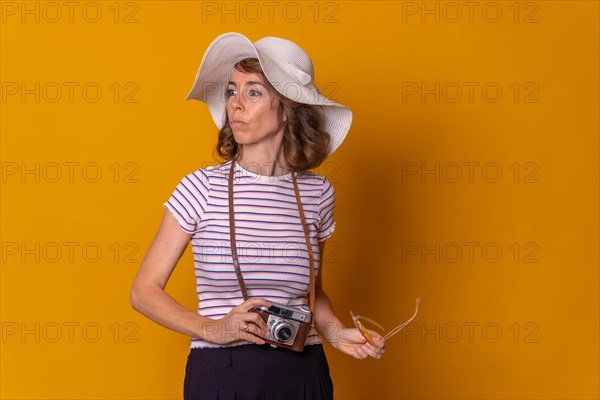Caucasian girl in tourist concept with hat