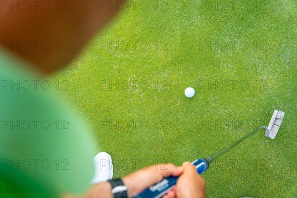 Man playing golf