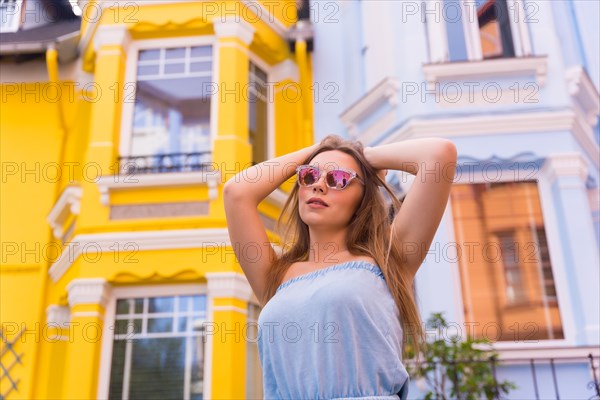 Portrait attractive blonde model wearing sunglasses