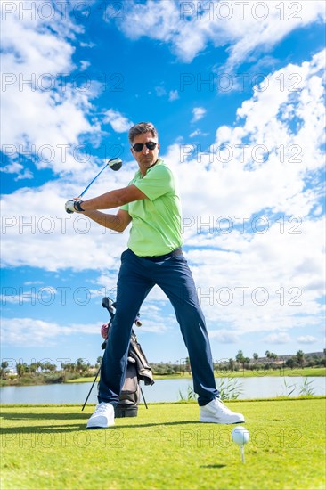 A player playing golf on a golf course