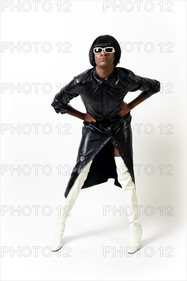 Black ethnic man in studio with white background