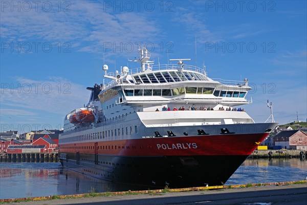 Hurtigruten ship turns in the harbour of Vardoe