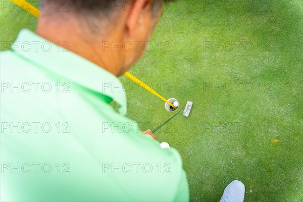 Man playing golf