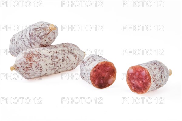 Closeup view of fermented mini parma sausages covered with white mold