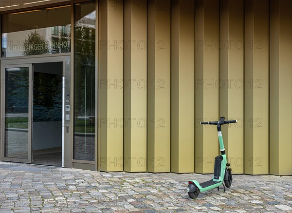 E-scooter parked in front of residential building