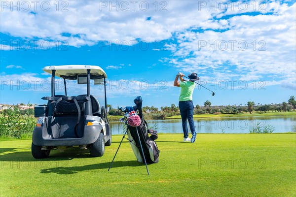 Playing professional golf on golf course