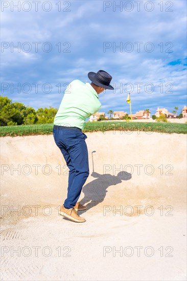 Man playing golf