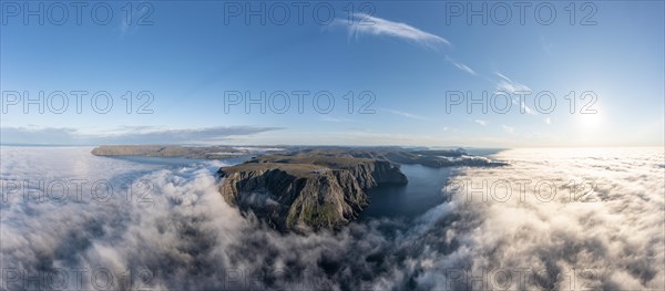 Panorama of the cliffs of the North Cape with foggy atmosphere