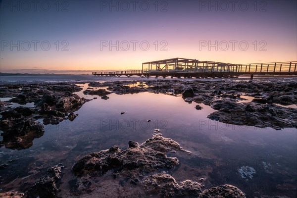 Long exposure at sunrise at the coast near Corralejo