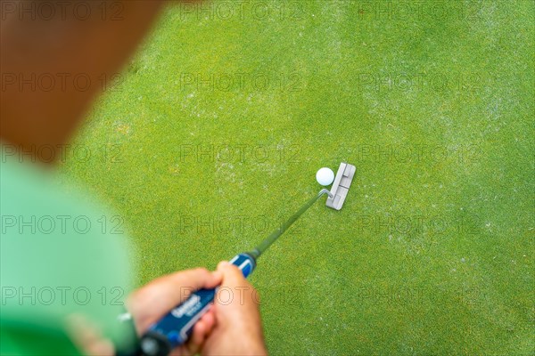 Man playing golf