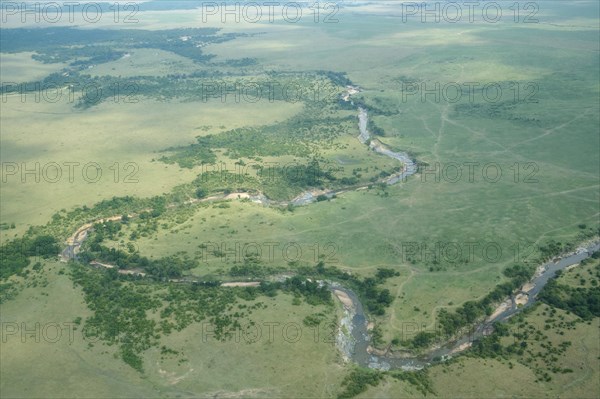 Savannah landscape with river from the plane