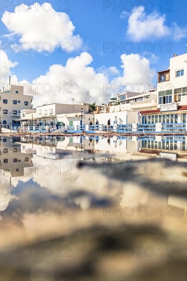 Typical white buildings and restaurants