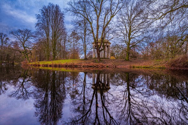 The Leibniz Temple as a pavilion building in the Georgengarten in Hanover in the North district with reflection in the lake